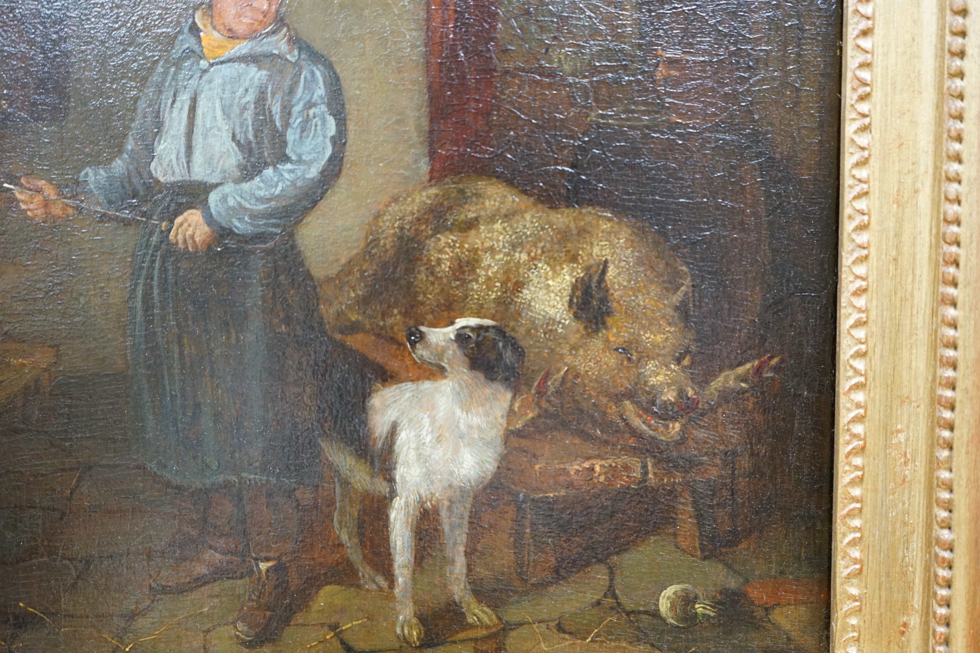 After George Morland (1763-1804), oil on oak panel, Interior with a figure preparing to butcher a pig, unsigned, 31 x 25cm